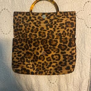 BP brand leopard clutch.
